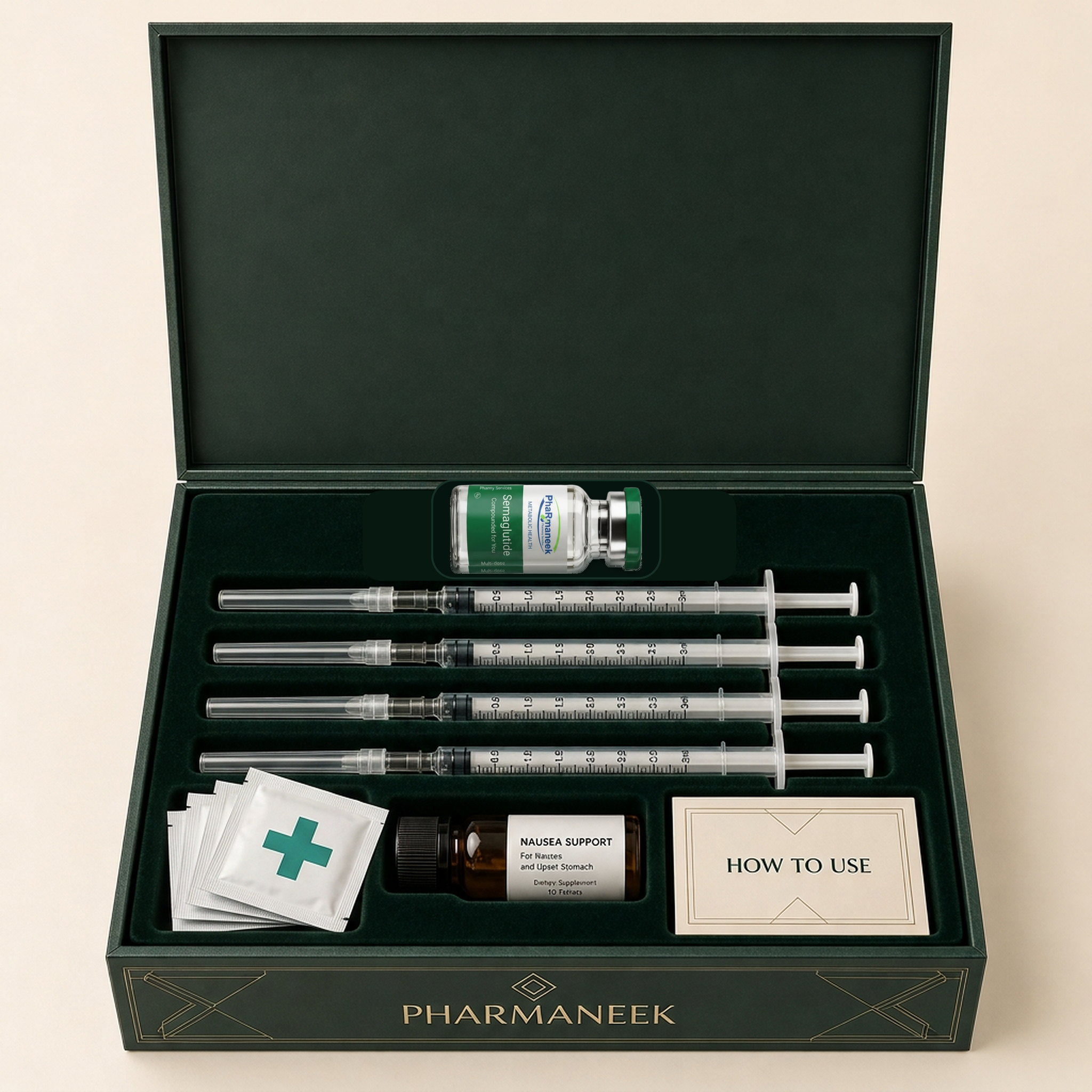 Open square Pharmaneek jewelry-style care box with one branded Pharmaneek Semaglutide vial, four syringes, alcohol pads, nausea-support medication, and a how-to-use guide lying flat in fitted compartments