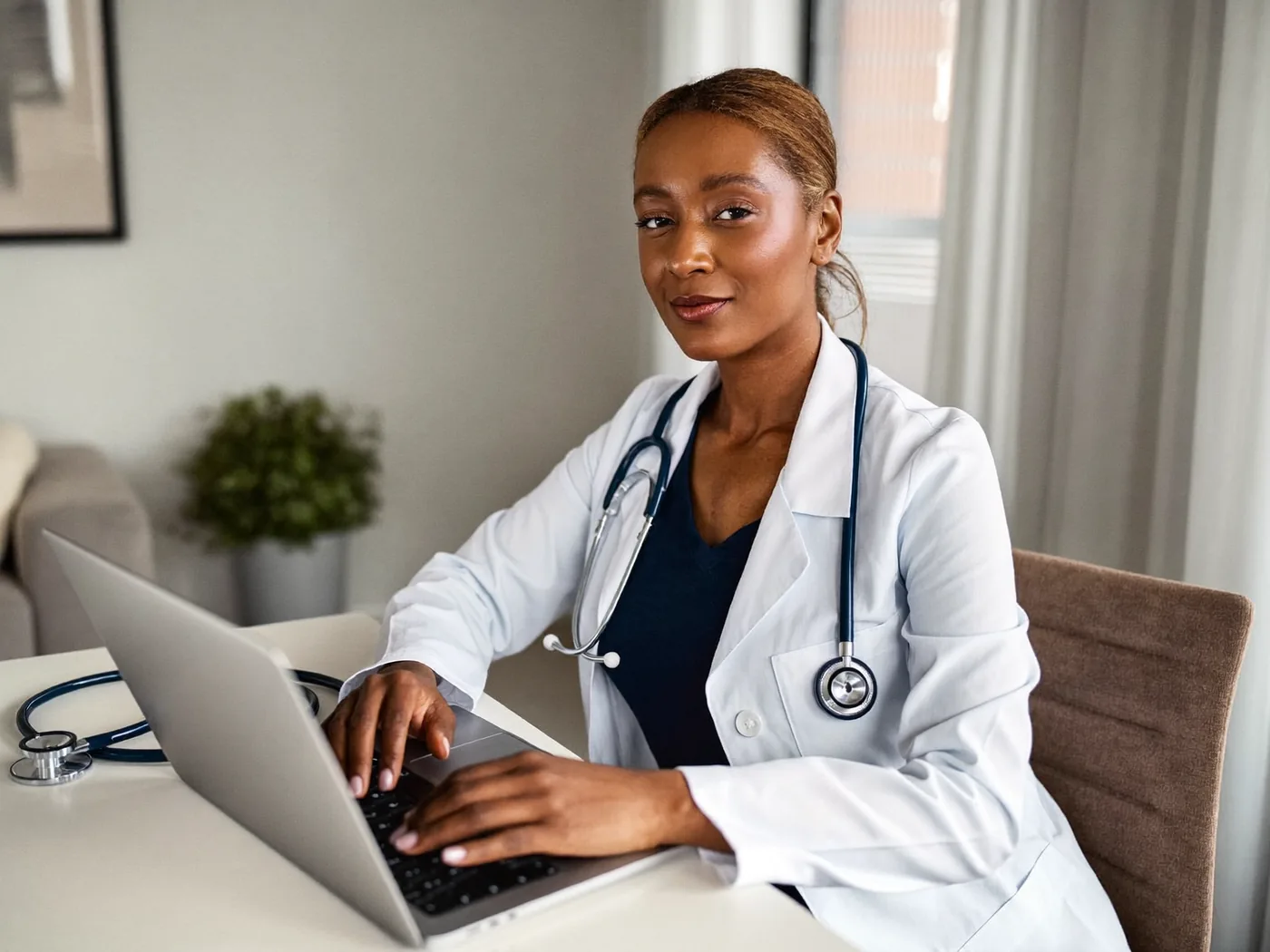 Licensed provider at her desk